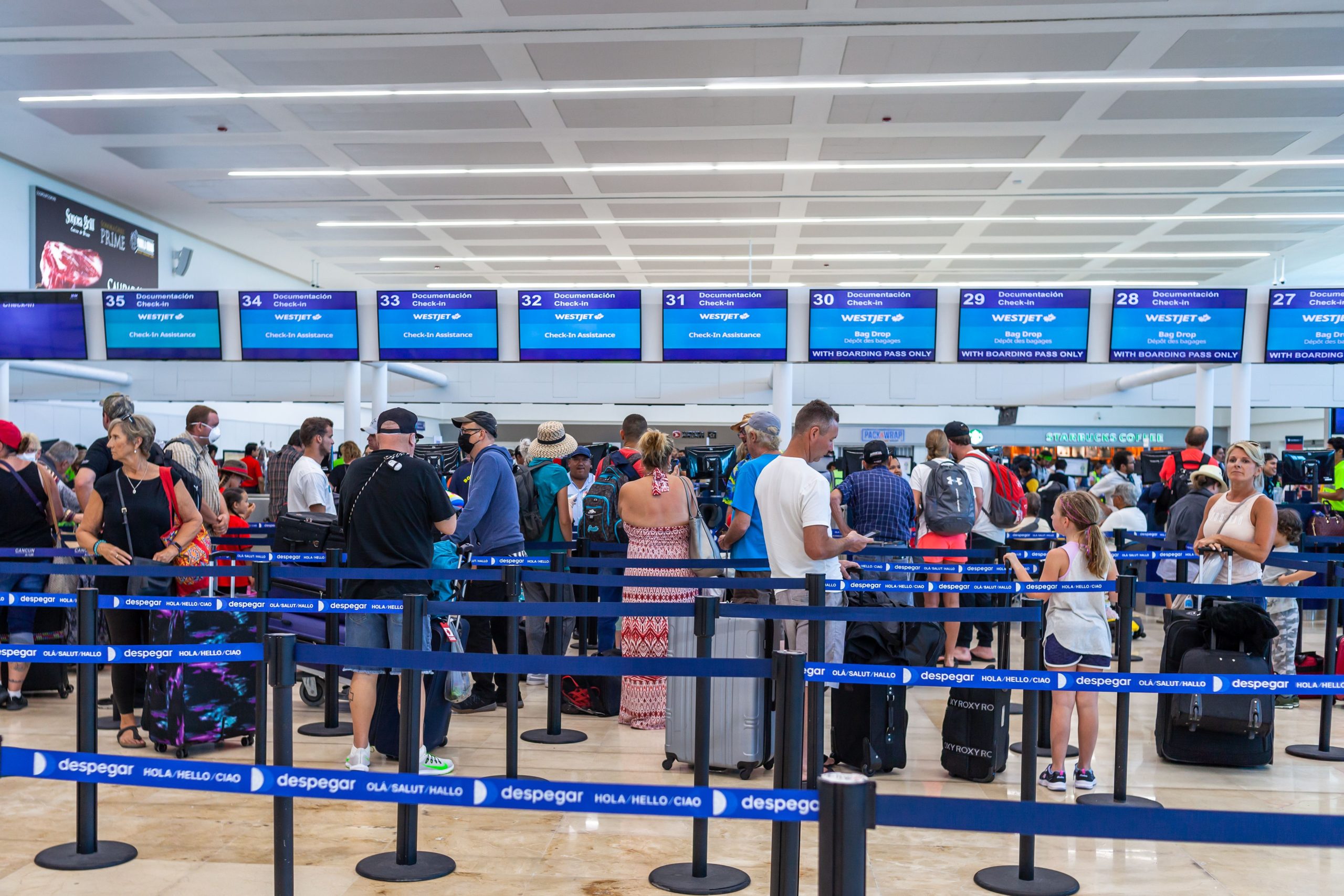 Cancun国際空港は、追加のEゲートと無料のWi-Fi変更で観光客を楽しませます